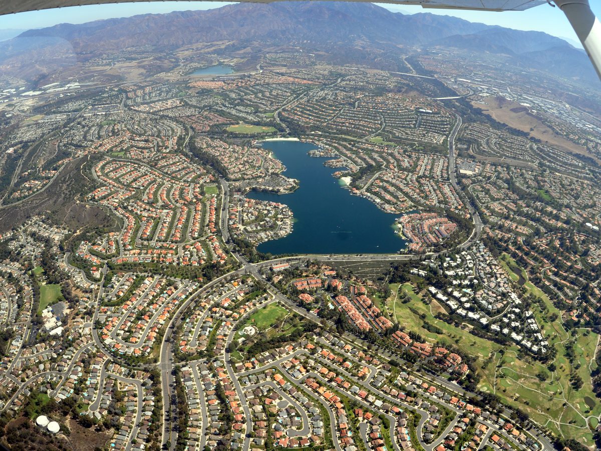 Aerial view of Lake Mission Viejo surrounded by Mission Viejo neighborhoods