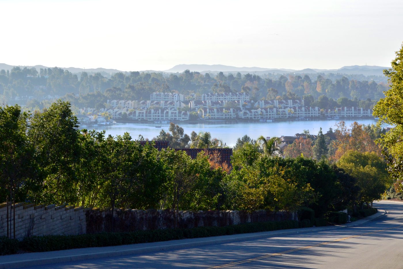View across Lake Mission Viejo from a residential ridge road in Mission Viejo, California