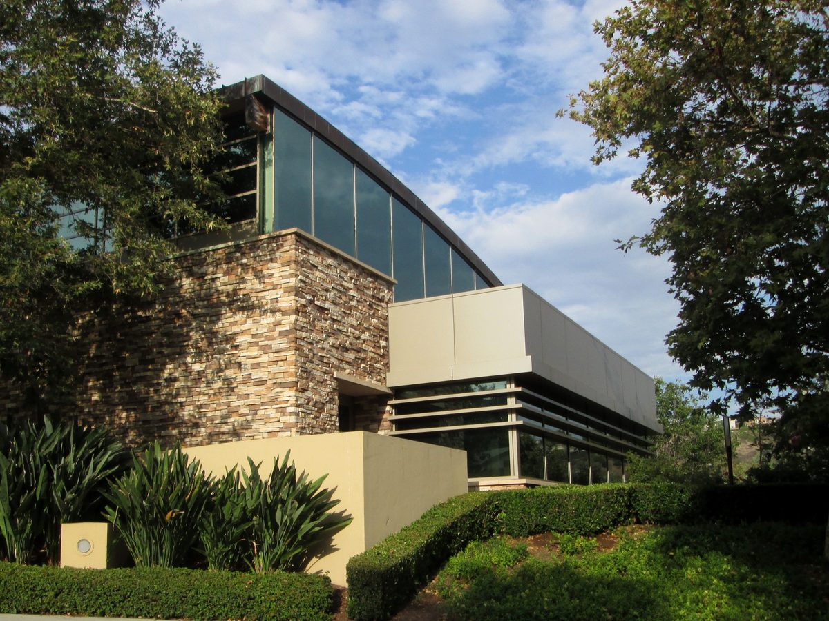 Modern stone and glass exterior of the Mission Viejo Library